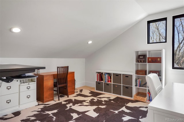 home office featuring vaulted ceiling