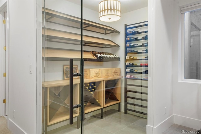 wine room featuring tile patterned floors