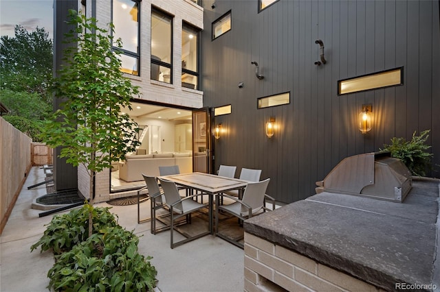 view of patio featuring an outdoor kitchen