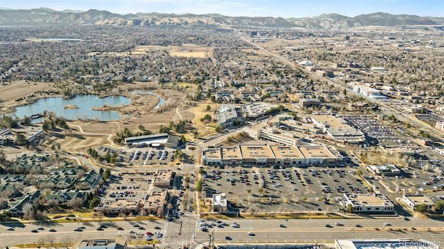 bird's eye view featuring a water and mountain view