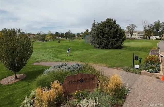 775 S Alton Way Unit 3D, Denver, CO 80247 - surrounding community with an area to practice putting, view of golf course, and a lawn