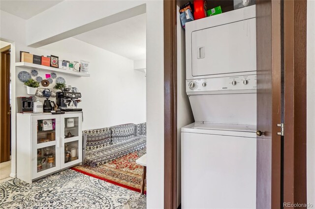 2900 Shadow Creek Dr Unit 201, Boulder, CO 80303 - clothes washing area featuring stacked washing machine and dryer