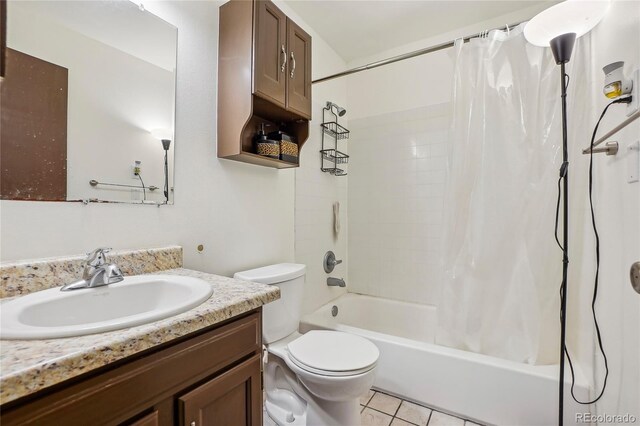 2900 Shadow Creek Dr Unit 201, Boulder, CO 80303 - full bath with vanity, shower / bathtub combination with curtain, toilet, and tile patterned floors