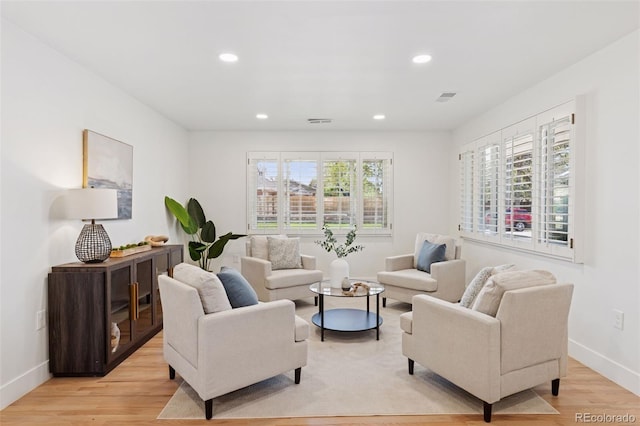3775 S Forest Way, Denver, CO 80237 - living room featuring light wood-style floors, baseboards, and recessed lighting