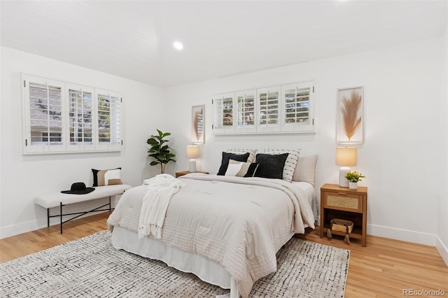 3775 S Forest Way, Denver, CO 80237 - bedroom with baseboards, light wood finished floors, and recessed lighting