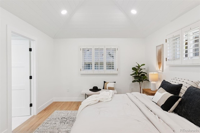 3775 S Forest Way, Denver, CO 80237 - bedroom with light wood finished floors, lofted ceiling, baseboards, and recessed lighting