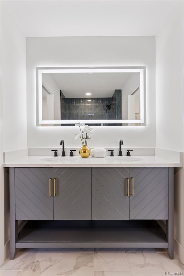 3775 S Forest Way, Denver, CO 80237 - bathroom featuring marble look tile flooring and double vanity