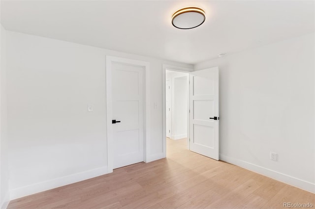 3775 S Forest Way, Denver, CO 80237 - unfurnished room featuring light wood-style flooring and baseboards