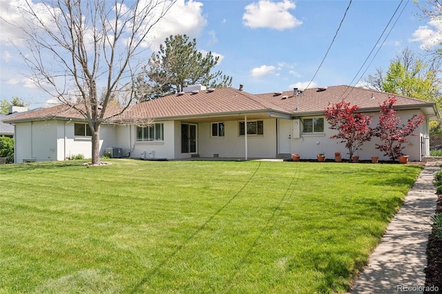 3775 S Forest Way, Denver, CO 80237 - rear view of property with a lawn, central AC unit, and stucco siding
