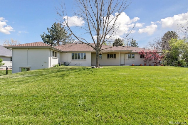 3775 S Forest Way, Denver, CO 80237 - back of house featuring central air condition unit and stucco siding