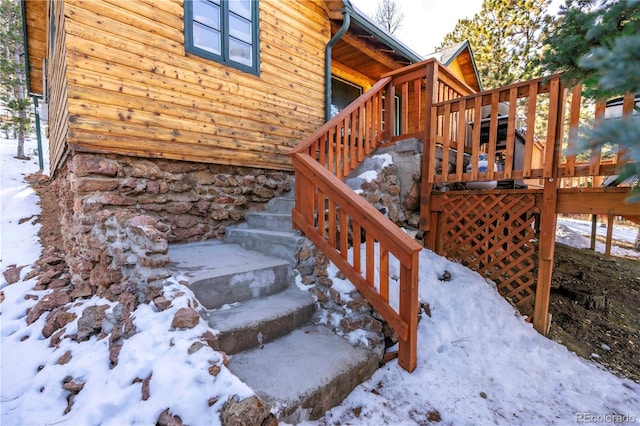 296 Anderson Rd, Bailey, CO 80421 - snow covered deck featuring stairway