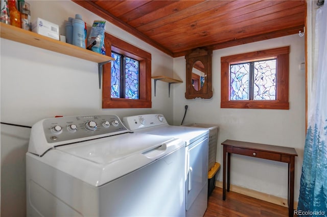 washroom featuring wood ceiling, washer and dryer, and dark hardwood / wood-style floors