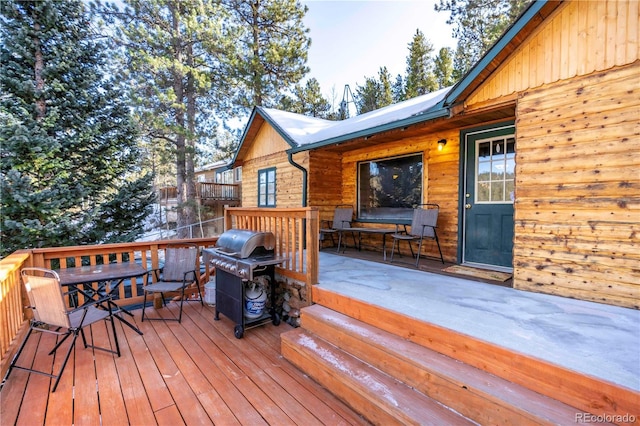 296 Anderson Rd, Bailey, CO 80421 - wooden terrace featuring area for grilling and outdoor dining area