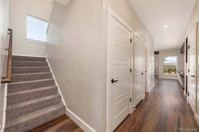 719 Saddle Ridge Cir, Granby, CO 80446 - stairs featuring wood finished floors, baseboards, and recessed lighting