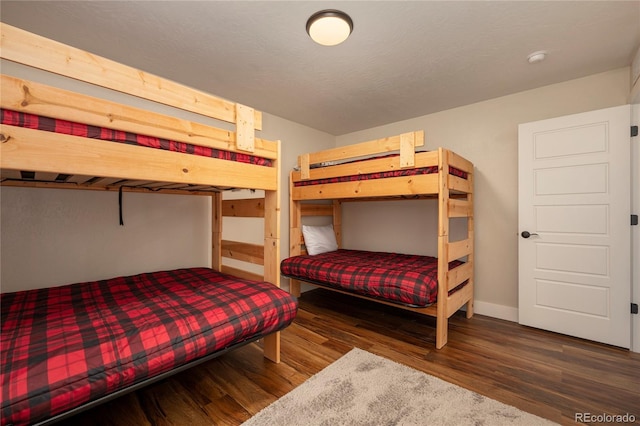 719 Saddle Ridge Cir, Granby, CO 80446 - bedroom with wood finished floors and baseboards