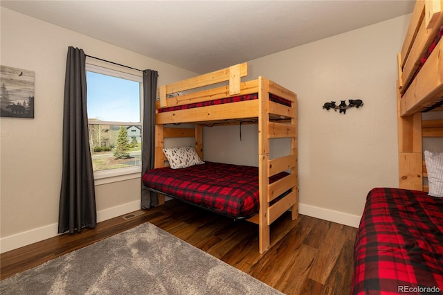 719 Saddle Ridge Cir, Granby, CO 80446 - bedroom featuring baseboards and wood finished floors