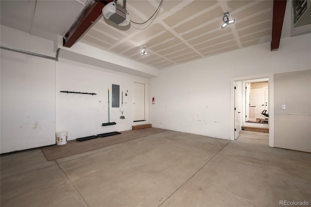 719 Saddle Ridge Cir, Granby, CO 80446 - garage featuring electric panel and a garage door opener
