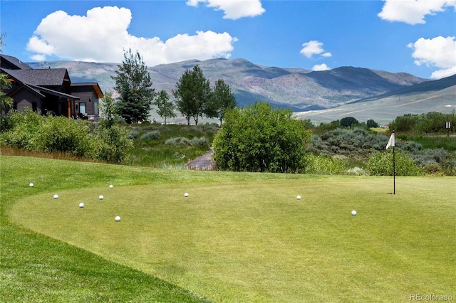 719 Saddle Ridge Cir, Granby, CO 80446 - view of community featuring a mountain view and a lawn