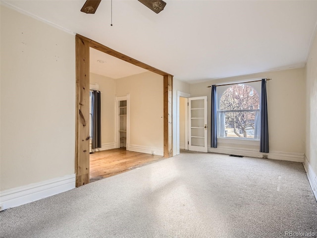 spare room with ceiling fan