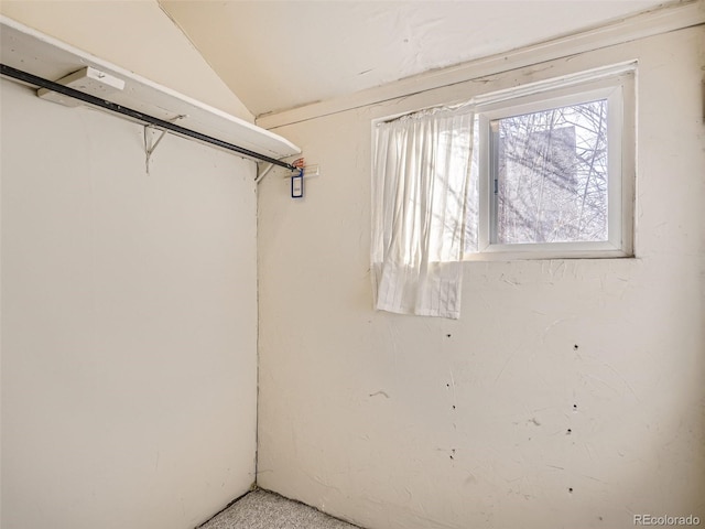 spacious closet featuring lofted ceiling