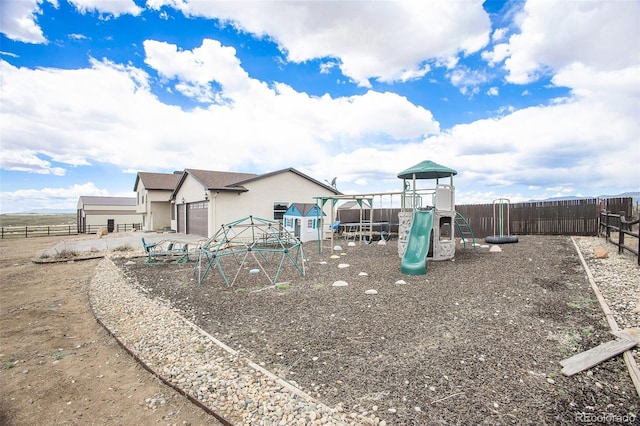 view of play area featuring fence