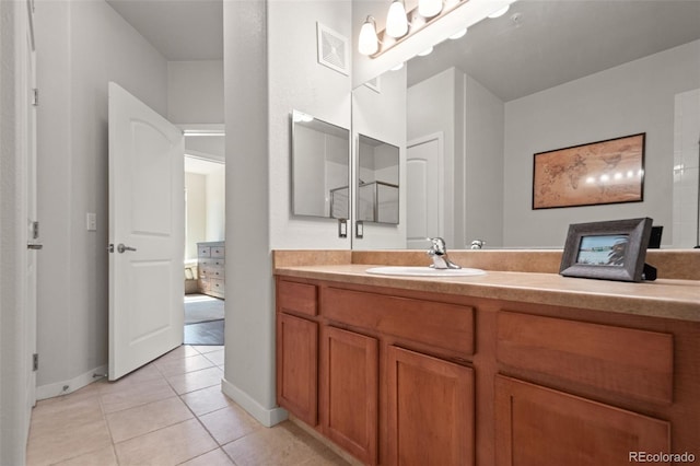 bathroom featuring vanity and tile patterned floors