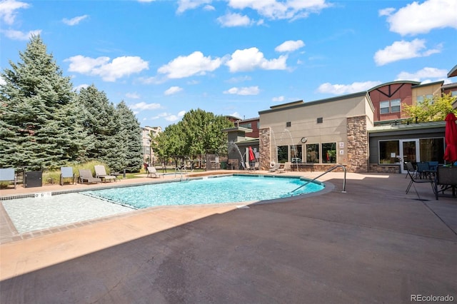 view of pool with a patio