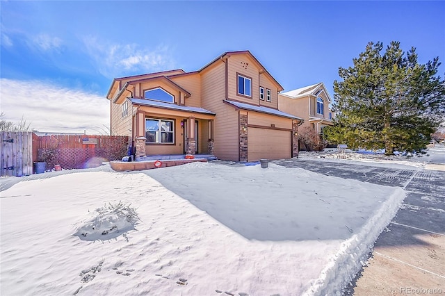 view of front of property with a garage