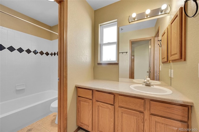 full bathroom with tub / shower combination, toilet, tile patterned flooring, and vanity