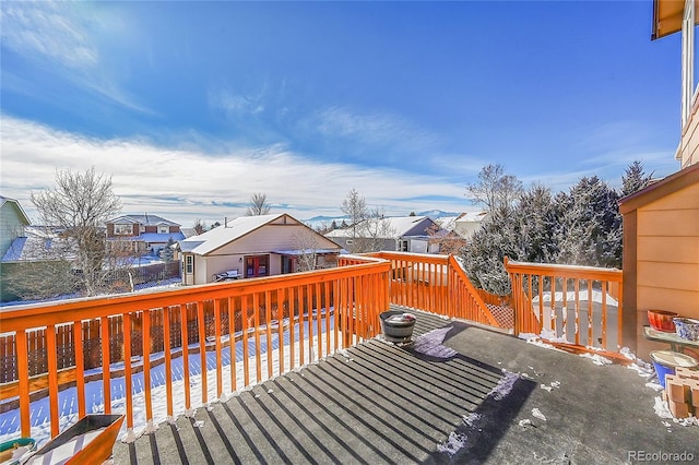 view of snow covered deck