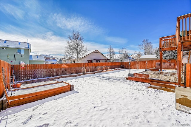 view of yard covered in snow