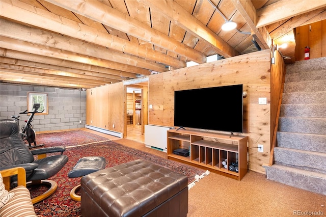 living room with beamed ceiling, a baseboard heating unit, and light carpet