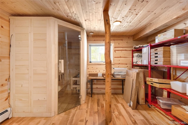 storage area featuring a baseboard radiator