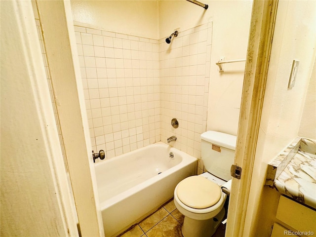 8826 E Florida Ave Unit 102, Denver, CO 80247 - bathroom featuring tile patterned flooring, toilet, and bathing tub / shower combination