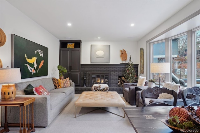 living room featuring a fireplace