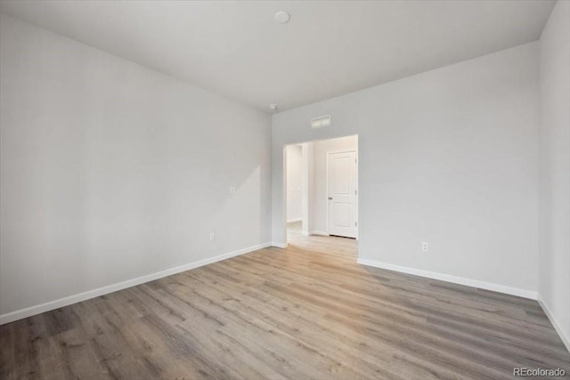 12353 E 101st Pl, Commerce City, CO 80022 - spare room with baseboards and wood finished floors