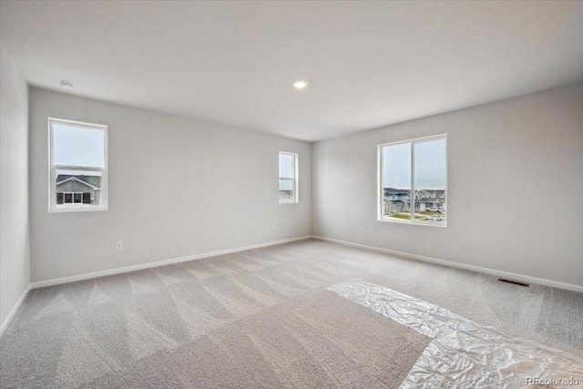 12353 E 101st Pl, Commerce City, CO 80022 - carpeted empty room featuring baseboards and visible vents