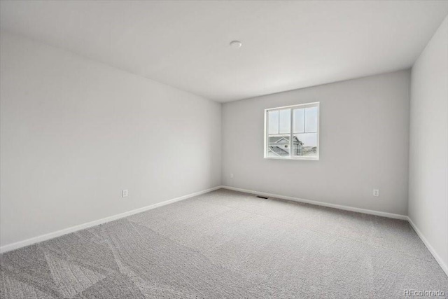 12353 E 101st Pl, Commerce City, CO 80022 - unfurnished room with baseboards and carpet flooring