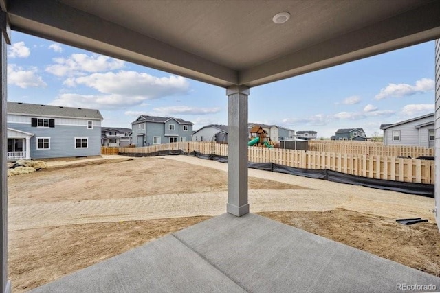 12353 E 101st Pl, Commerce City, CO 80022 - view of yard with a playground, a patio, a residential view, and fence