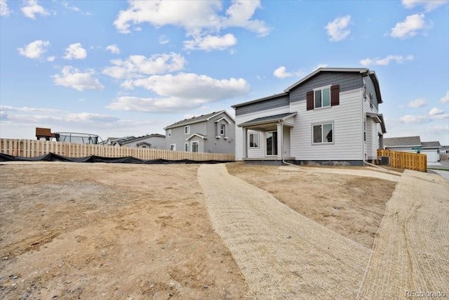 12353 E 101st Pl, Commerce City, CO 80022 - rear view of house with fence