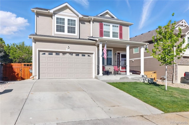 1673 Morningview Ln, Castle Rock, CO 80109 - view of front facade featuring a porch, an attached garage, and driveway
