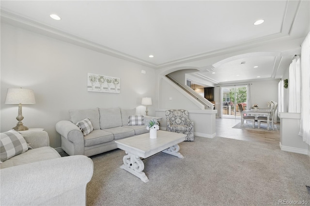 1673 Morningview Ln, Castle Rock, CO 80109 - living area featuring arched walkways, carpet floors, recessed lighting, stairs, and baseboards