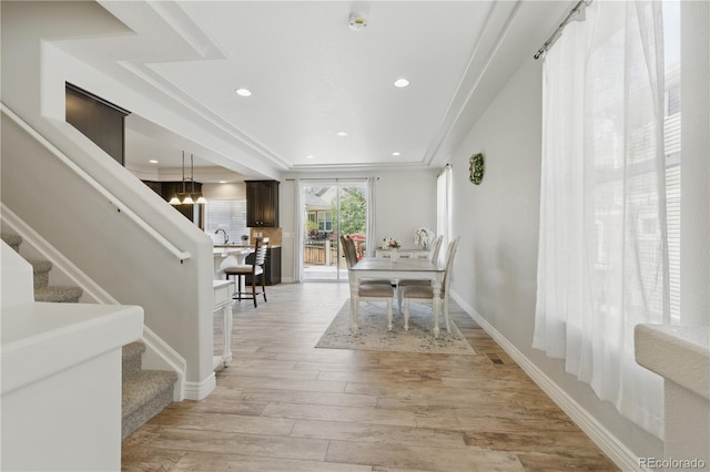 1673 Morningview Ln, Castle Rock, CO 80109 - dining space with stairway, light wood finished floors, recessed lighting, crown molding, and baseboards