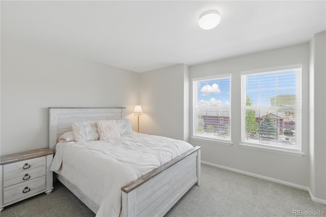 1673 Morningview Ln, Castle Rock, CO 80109 - bedroom featuring baseboards and light carpet