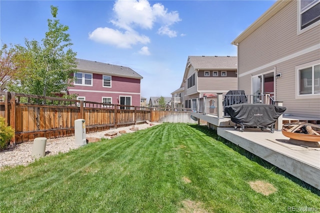 1673 Morningview Ln, Castle Rock, CO 80109 - view of yard featuring a wooden deck and an outdoor fire pit