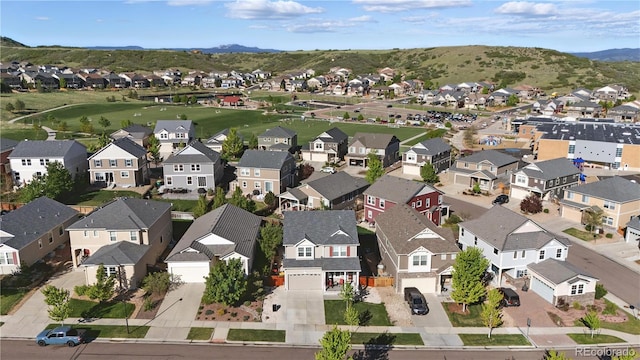 1673 Morningview Ln, Castle Rock, CO 80109 - aerial view of residential area featuring a mountainous background and a local golf course