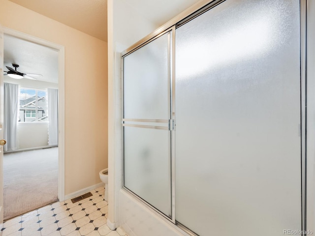 bathroom featuring baseboards, a ceiling fan, visible vents, and tile patterned floors