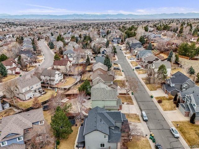 bird's eye view featuring a residential view and a mountain view