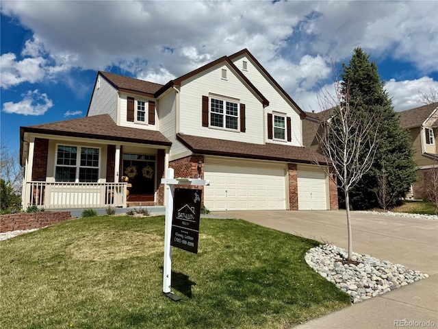 view of front of home with driveway, covered porch, brick siding, a front yard, and a garage