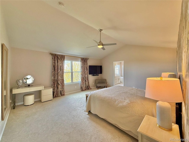 bedroom featuring baseboards, vaulted ceiling, carpet flooring, and a ceiling fan